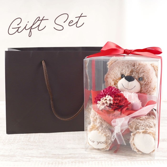 しあわせ運ぶくまの花便り